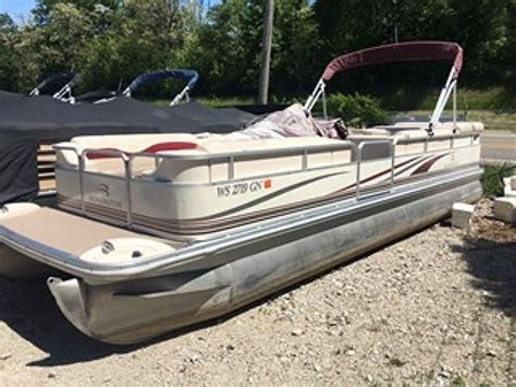 With three adults on board and 34 of a tank of fuel, our test boat&39;s 115 hp Yamaha four-stroke topped out at 23. . 2003 bennington 257l